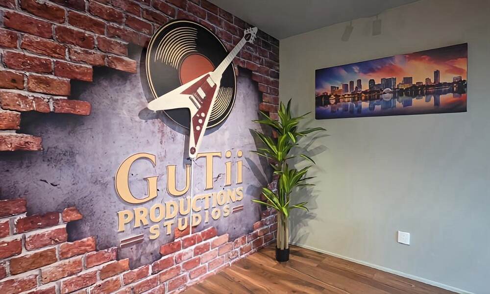 Signature Flying V and vinyl brand wall